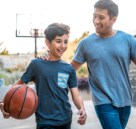 Fatehr and Son playing basketball