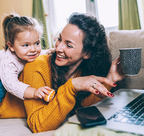 woman and daughter in front of a computer